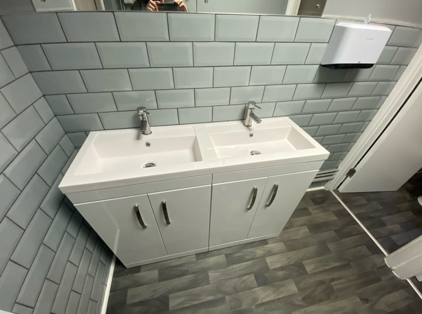 Before and after photos of three renovated commercial bathrooms
